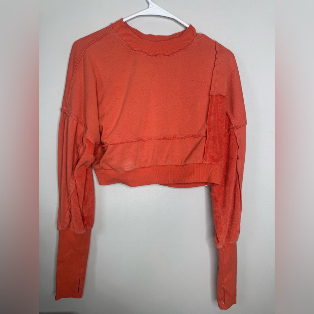 Free People Cropped Raw-Edge Sweatshirt in Coral Orange